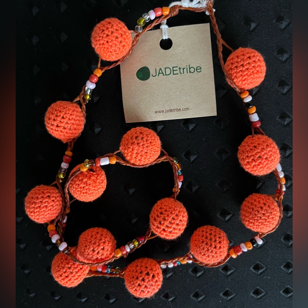 Jade tribe orange pom pom necklace